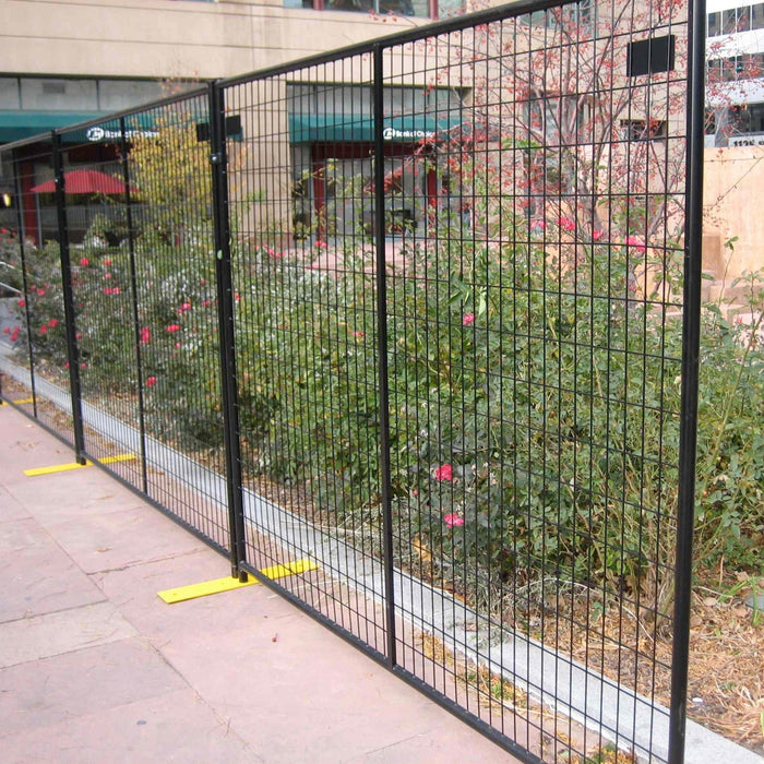 Durable 6'x7.5' black fence panel used for crowd control and perimeter safety.