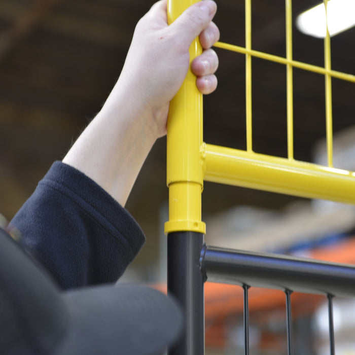 Metal no-climb panel connector designed for vertical fence extensions.